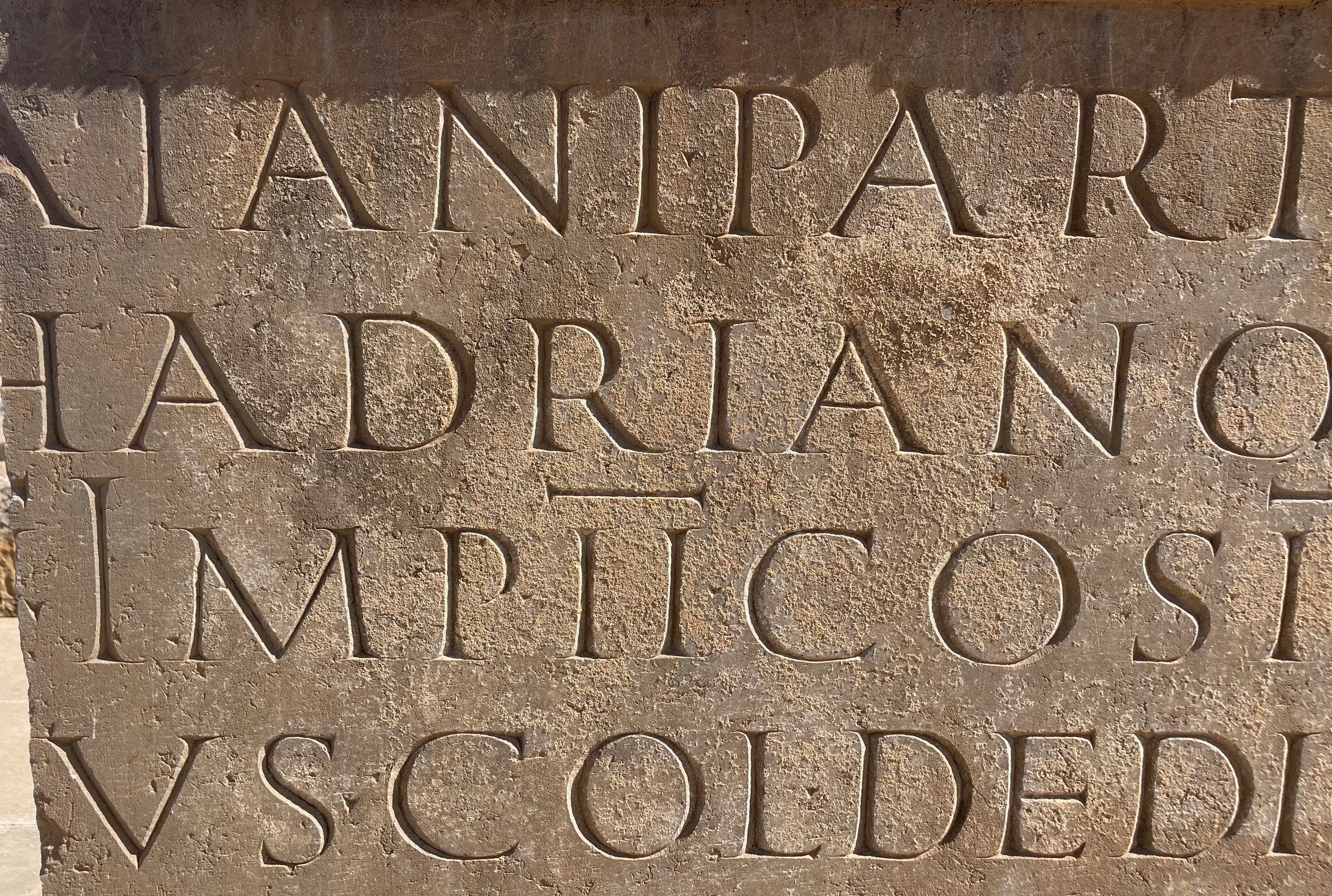 Latin text carved into stone