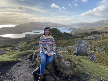 Ellen posing on a rock in the Highlands.